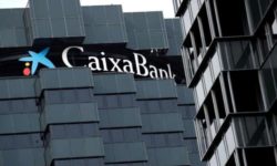 Caixabank şi Bankia formează cel mai mare grup bancar spaniol, cu active de 650 de miliarde de dolari